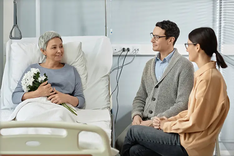 Two people visiting their loved one.