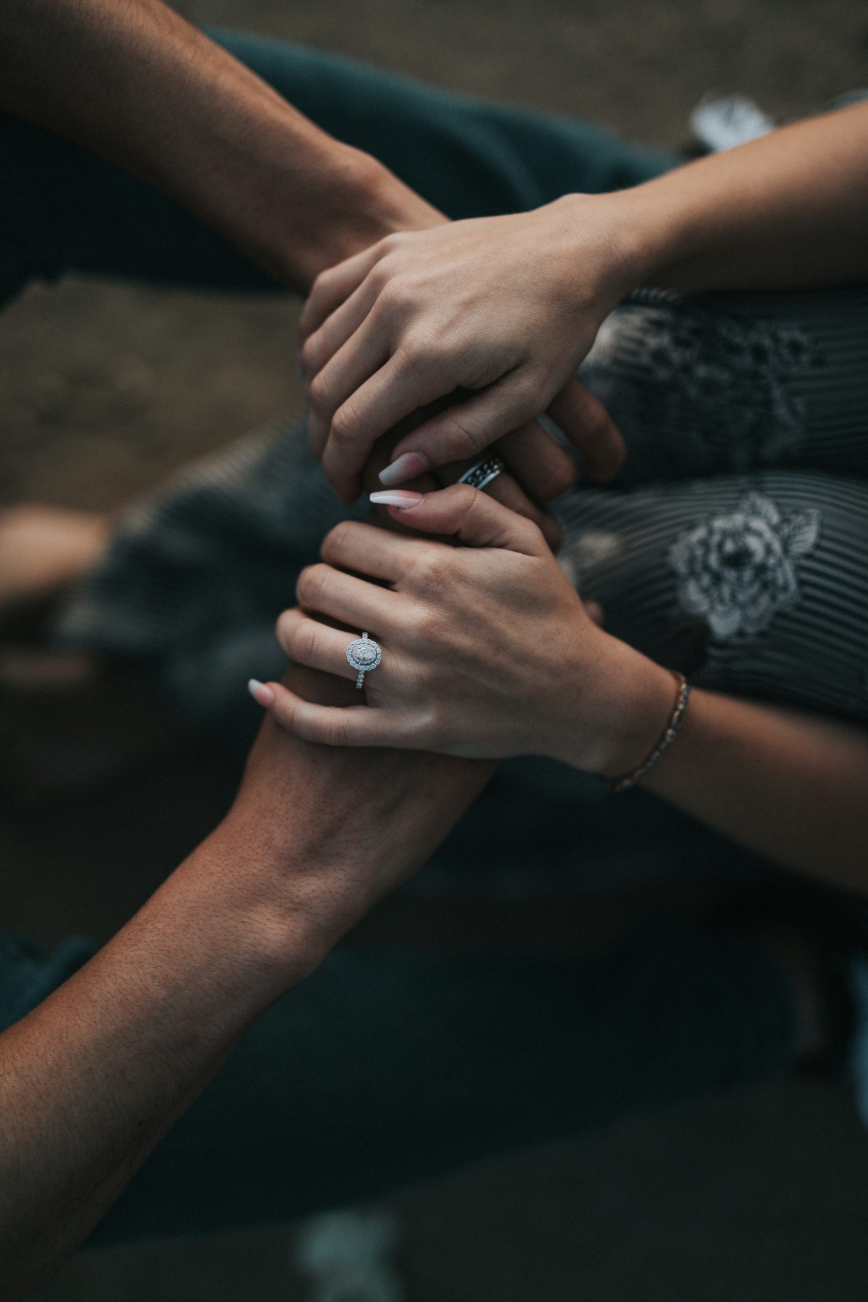 A couple holding hands.